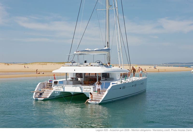 lagoon 620 anchored on a caribbean beach