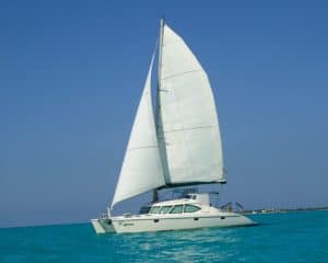 catamaran guru helped the owners of the kanina sailing school business find and purchase their catamaran and put it into business